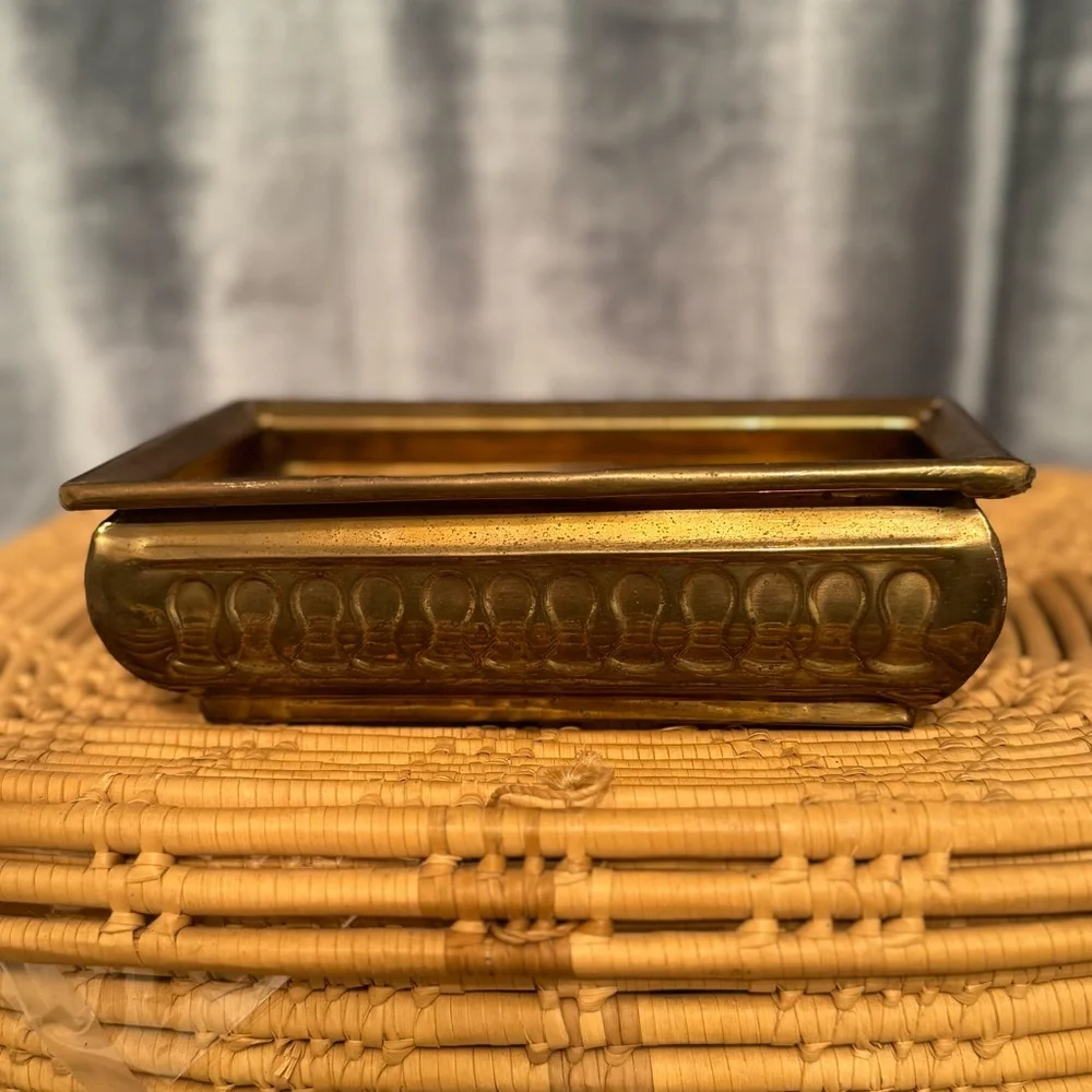 vintage brass planter, also known as a jardinière or cachepot.